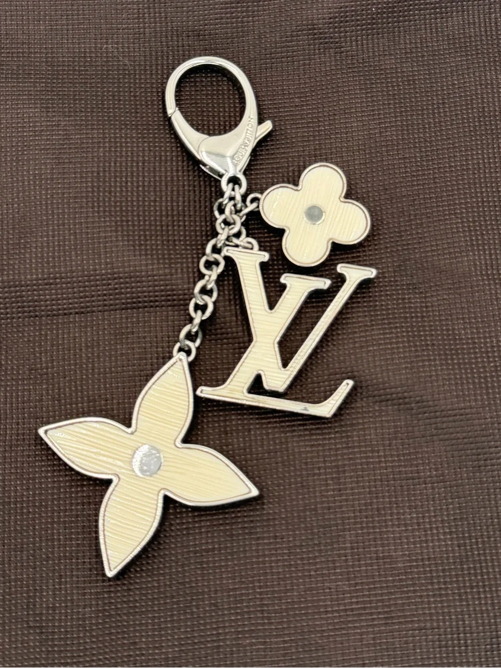 Authentic Louis Vuitton Fleur d’Epi Silver & Cream Bag Charm w/Dust Bag and COA